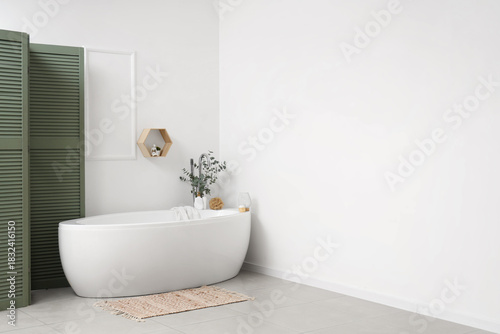 Interior of bathroom with b...
