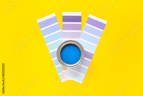 Can of blue paint and color...
