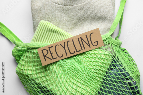 Bag with recycling logo and...