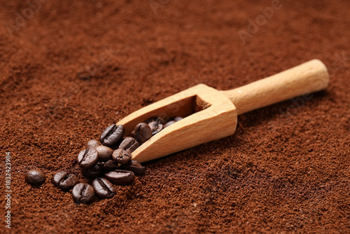 Roasted coffee beans in woo...