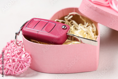 Gift box with car key on wh...