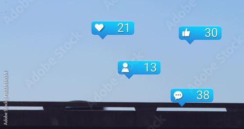 Blue social bubbles growing above bridge, vehicles passing raising counters and showing engagement