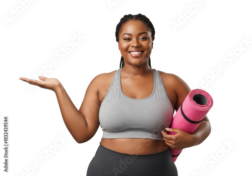 Smiling plus size woman holding yoga mat and gesturing.