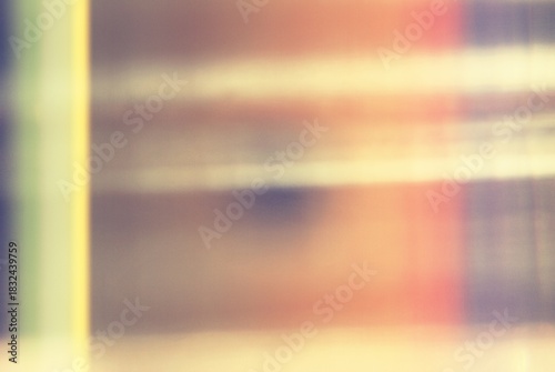 Abstract blurry colorful background with vibrant pastel gradient tones and retro light leak effect for design projects