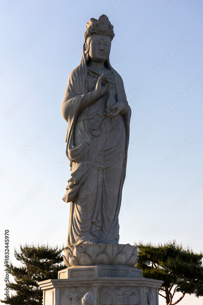 Fototapeta premium Seawater Avalokitesvara Statue at Naksansa Temple in Gangwon Province