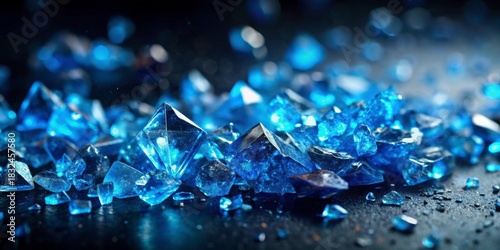 Vibrant Blue Crystal Fragments on Dark Background for Creative Projects