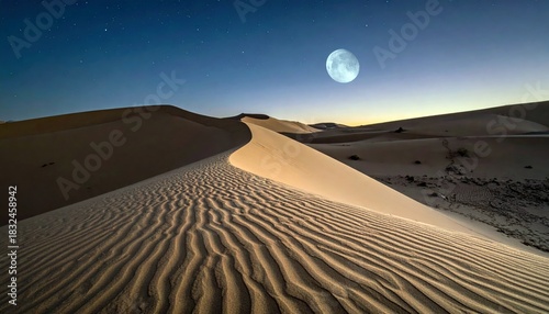 Fototapeta Naklejka Na Ścianę i Meble -  Panoramic view of sand dunes under a starry night sky with a full moon, creating a serene and peaceful atmosphere.