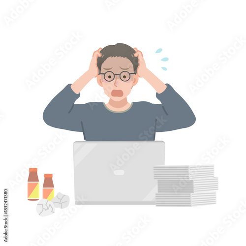 仕事が終わらずに焦るフリーランスの男性