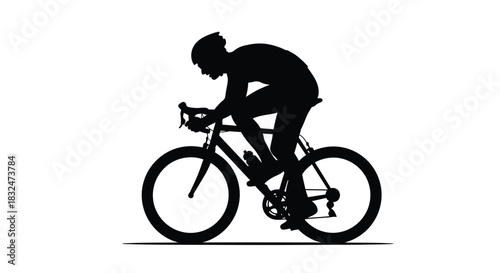 Silhouette of a male cyclist riding a road bicycle, depicting speed and motion in a competitive sport or leisure activity