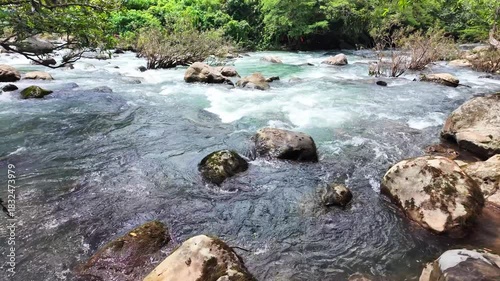 Superb view of summer: Slow motion of the fantastic Moot valley in Phong Nha National Park, Vietnam with the sound of a clear stream flowing through the peaceful tropical jungle