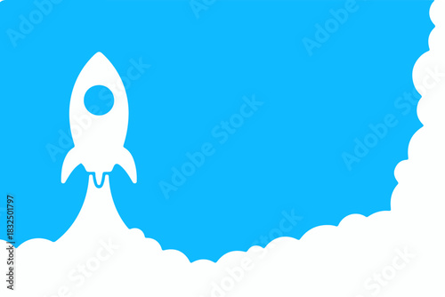 white rocket flying up in blue sky with cloud smoke