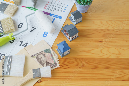 カレンダーと塗装道具と日本のお金｜DIY・リフォーム・塗装業者・スケジュールと費用　イメージ