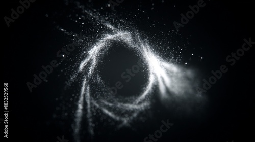 A dark space with whirling particles, forming a blurred vortex shape with a black center