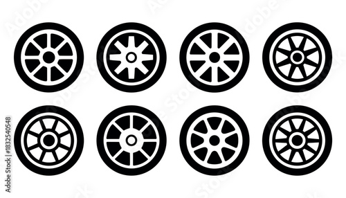 Eight black car wheel icons with different spoke designs on white background automobile wheel tire