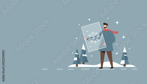 Winter character holds a snowflake graphic on glass outside snowy trees copy space available