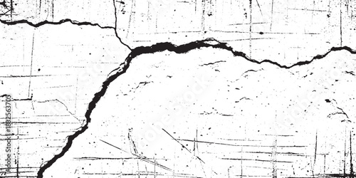 Cracked concrete surface with rough texture and deep fissures.