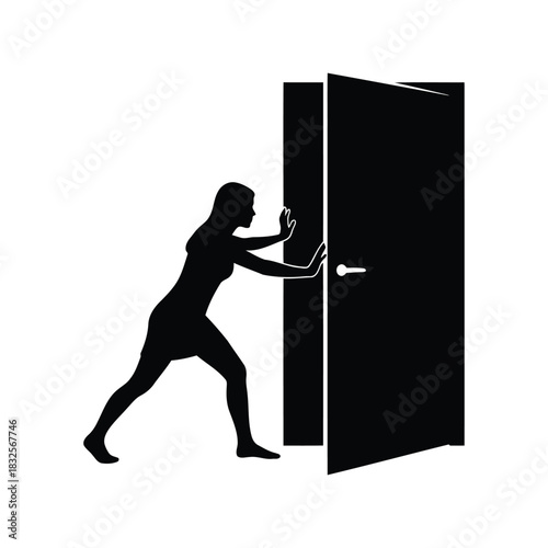 Silhouette woman pushing open dark door