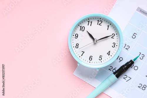 Calendar with alarm clock a...