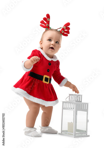 Cute little baby in Santa c...