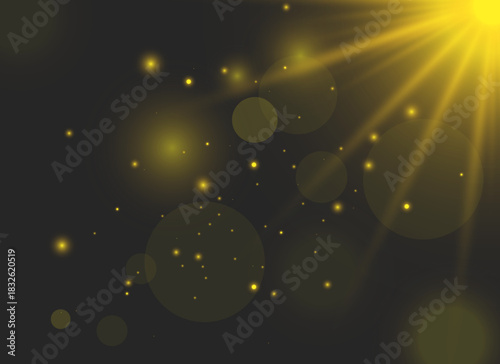 Golden glow light burst with warm sparkle particles on a dark background