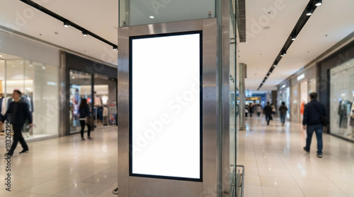 Blank Billboard Display in a Modern Shopping Mall, a Digital Advertising Screen in a Retail Environment.
