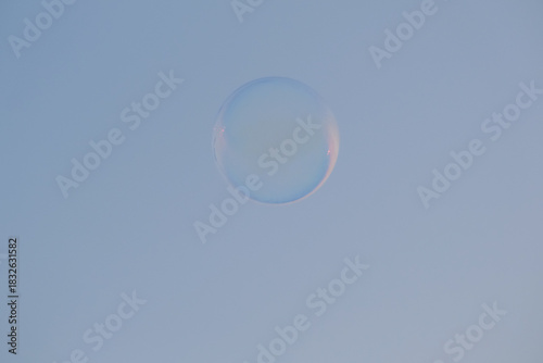 soap bubbles on blue sky