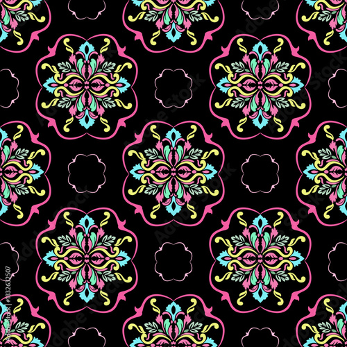 Multicolor damask ethnic floral seamless pattern on a black background. Abstract kaleidoscope fabric design texture.  Retro vintage style. Vector texture. Ideas for textiles, wallpapers, and rugs.