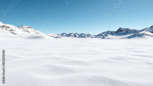 Snow field tundra mountain horizon under clear blue sky with serene cold light