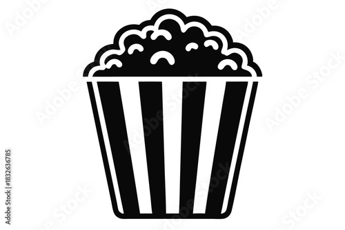 A bucket of delicious popcorn with black and white stripes is displayed