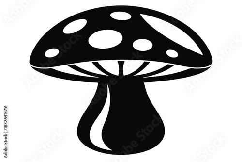 Simple black and white mushroom has a classic shape and spotted cap