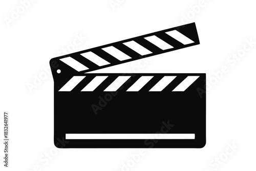 Black clapboard showing a film slate with white stripes is isolated against white