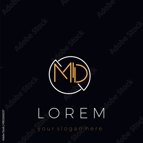 The logo is the initials MD. The monogram logo is framed within the letters MD.