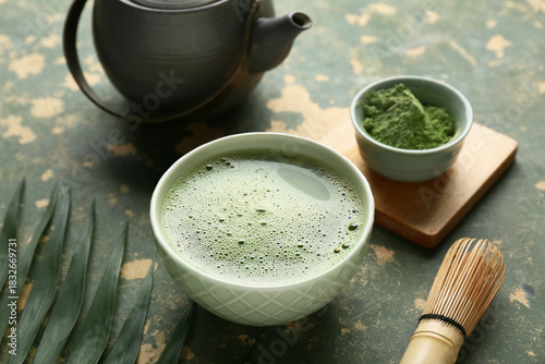 Bowl of fresh matcha tea wi...