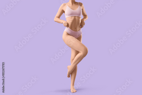 Young woman in underwear on...