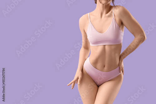 Young woman in underwear on...