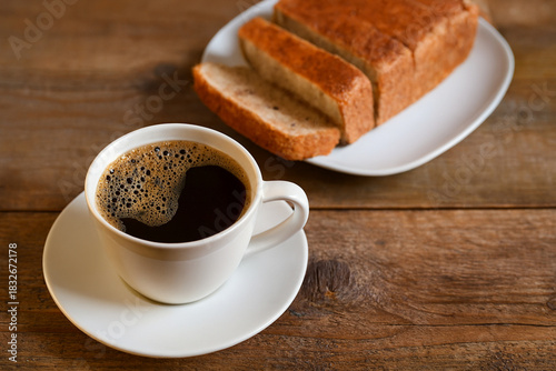 cup of coffee and bread for breakfast
