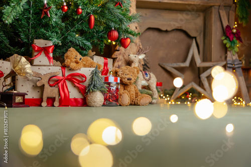 Beautifully illuminated Christmas decoration with sparkling lights, Christmas trees, stars, teddy bears and presents.	
