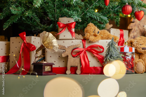 Beautifully illuminated Christmas decoration with sparkling lights, Christmas trees, stars, teddy bears and presents.	
