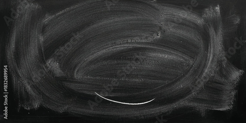 Chalkboard texture with smudges and a simple hand-drawn smiling face design