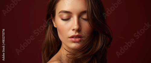 Elegant beauty portrait perfect for skincare, makeup, or hair product campaigns. The serene mood and high-quality lighting create a luxurious, professional feel.