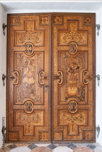 Ornate Carved Wooden Doors with Renaissance Motifs at Ambras Castle Innsbruck Austria