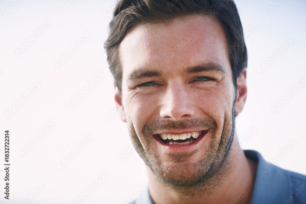 Obraz premium Mockup space, portrait and smile of man outdoor in natural environment for break or summer wellness. Blue sky, confident and happy with mature person in nature to relax for morning or weekend