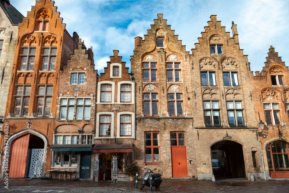 Fototapeta premium Traditional building architecture along a plaza in Brugge in Flanders, Belgium