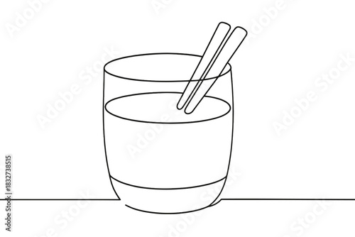 Minimalistic Eggnog Art. Eggnog with cinnamon sticks. Minimalistic one-line drawing glass of eggnog with