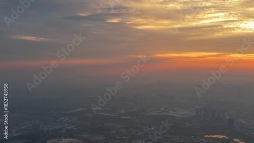 A Full Sky of Golden Dawn Illuminates a Hazy Metropolis, Nanning Awakens in Splendor