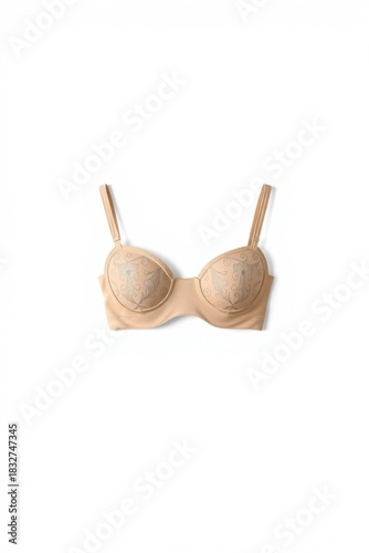Elegant beige bra with delicate floral design, isolated on a clean white background.
