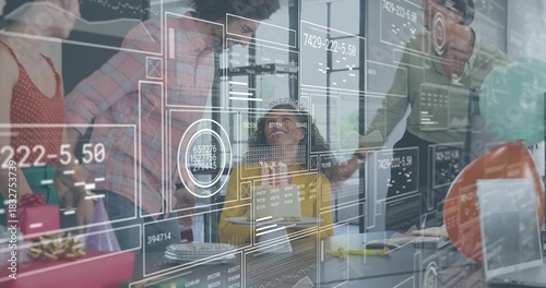 Celebrating coworker in yellow top, glasses at conference table with gifts, glass overlays