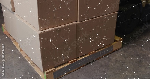 Showing stacked corrugated boxes sitting on pallet on warehouse floor with constellation overlay