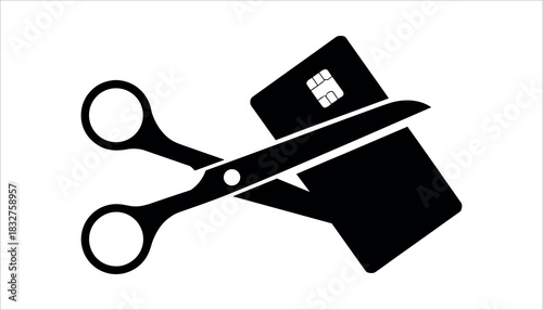Black scissors cutting a black credit card with chip on white background financial debt