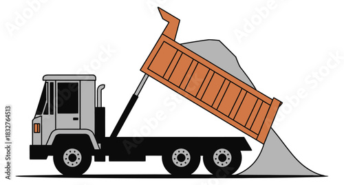 A dump truck unloads its load of gravel onto the ground.